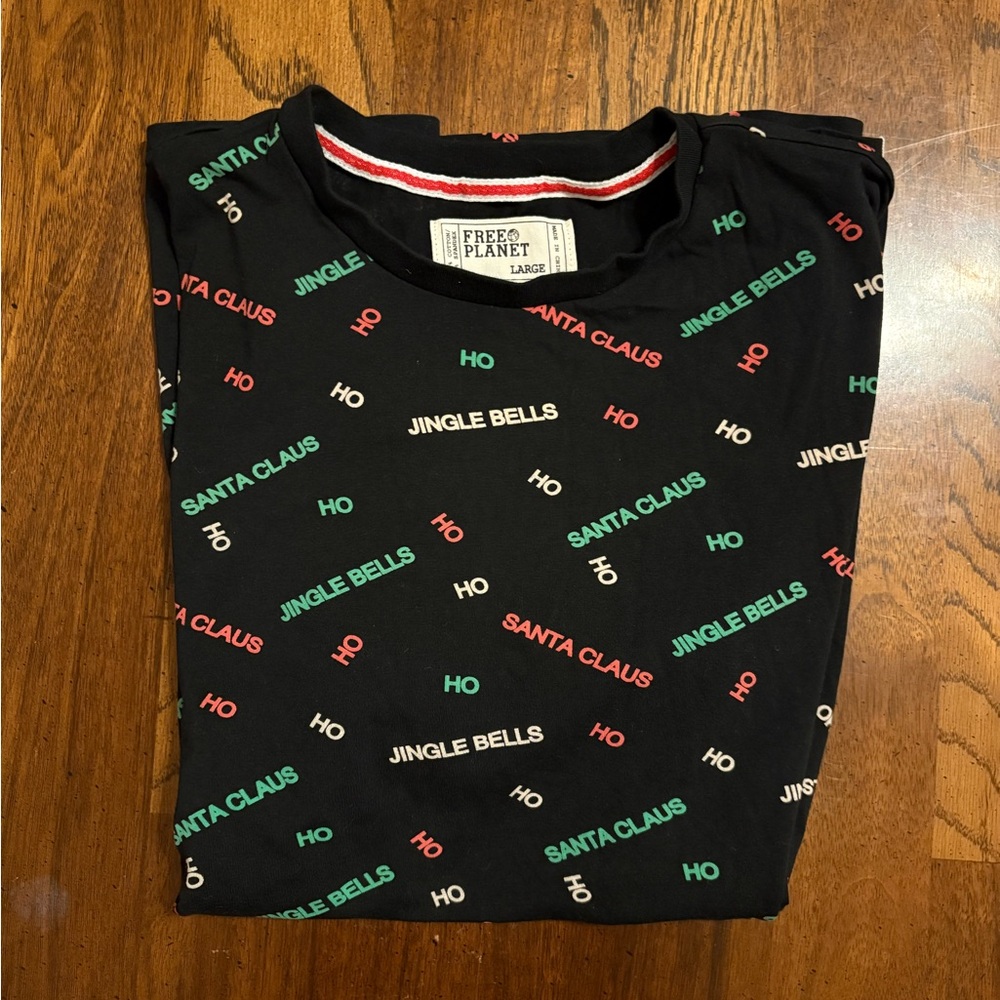 Free Planet Black T-Shirt with Festive Text